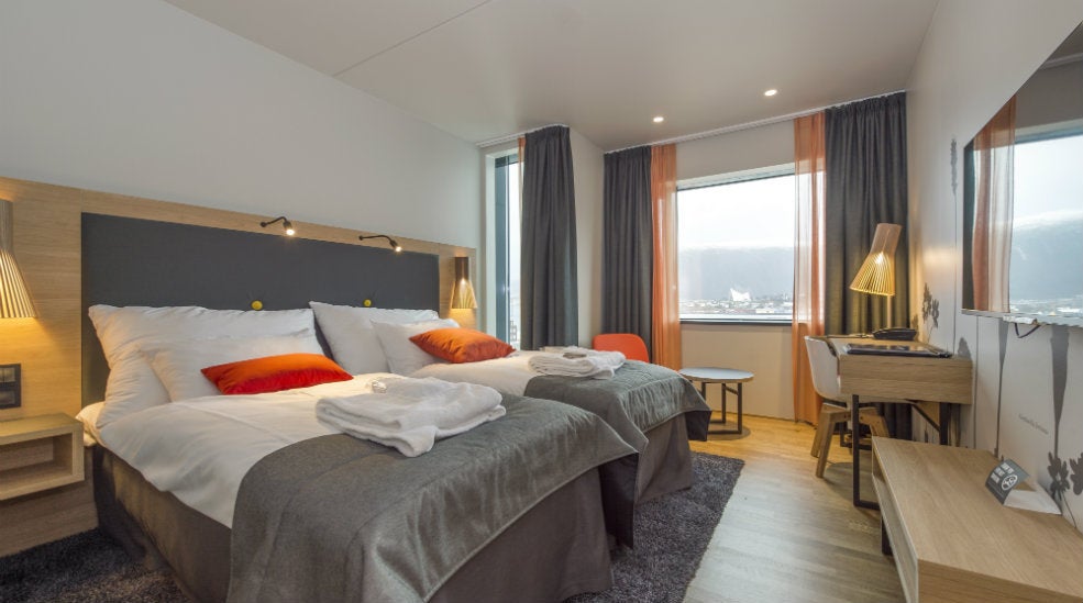 Superior twin hotel room with two double beds at The Edge Hotel in Tromso