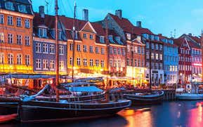 The restaurants and boats in Nyhavn, Copenhagen on a summer night