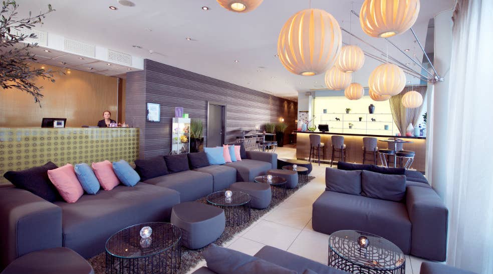 Extensive lobby with sofas at Aurora Hotel in Tromso