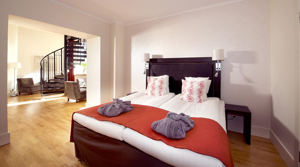 Extensive superior room in two levels at Bolinder Munktell Hotel in Eskilstuna