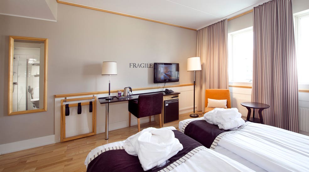 Well-equipped spacious superior twin hotel room at Fregatten Hotel in Varberg