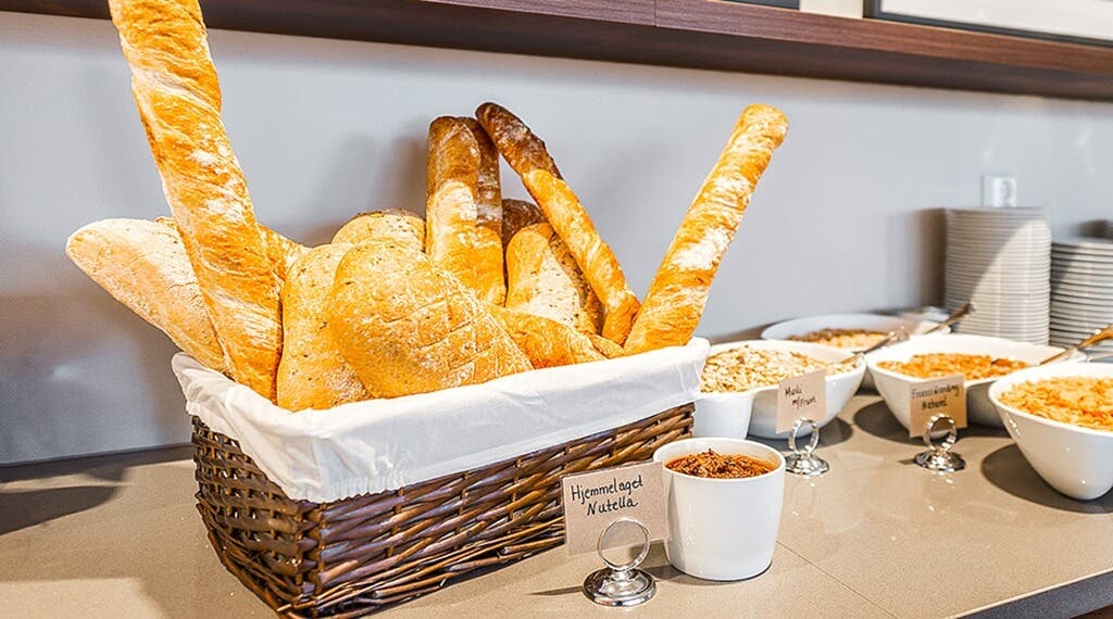 Breakfast buffet with freshly made bread at Helma Hotel in Mo i Rana