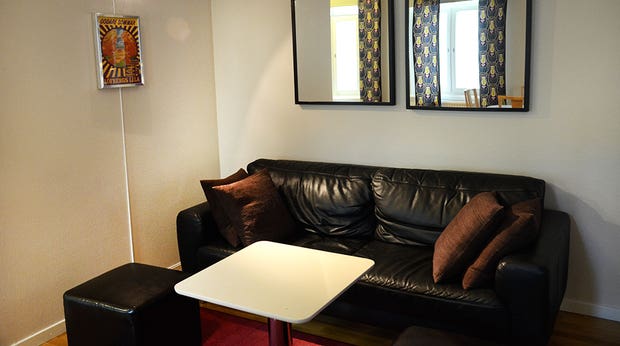 Well-furnished junior suite living room at Plaza Hotel in Karlstad