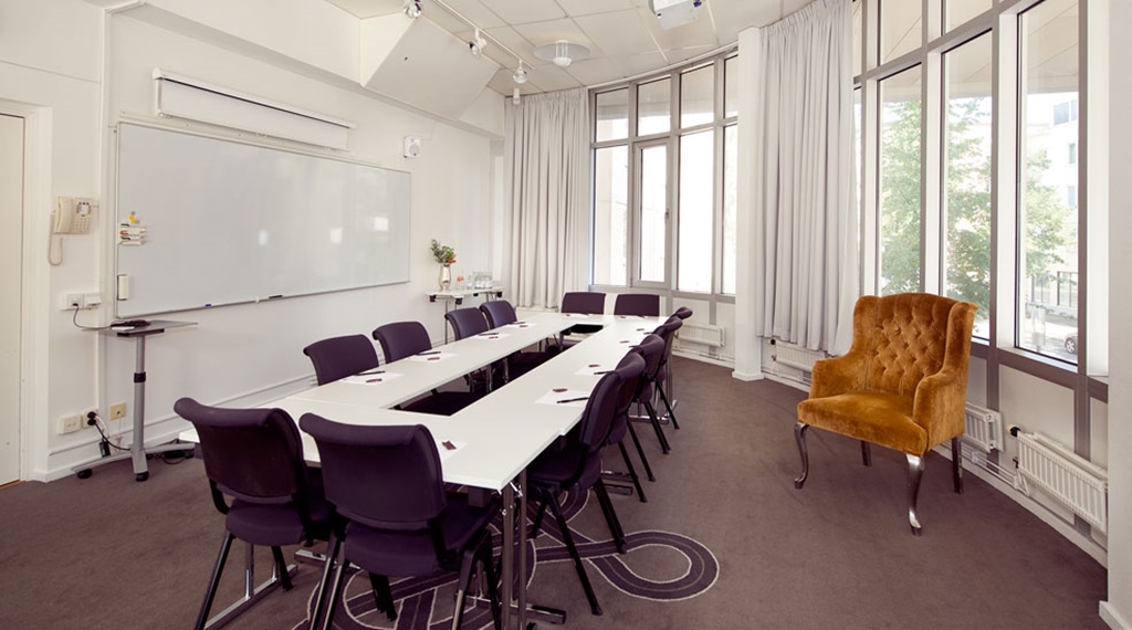Modern conference room with large windows at Tapto Hotel Stockholm