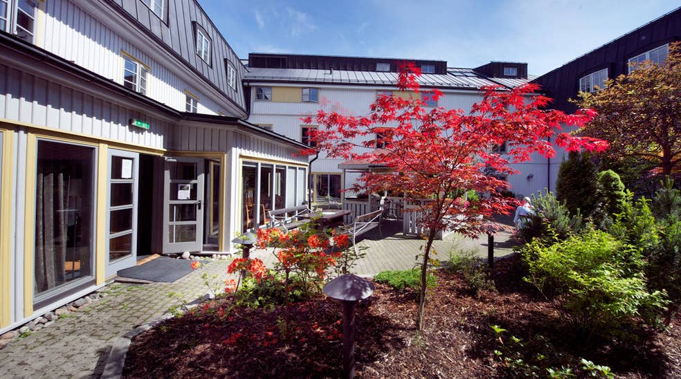 Spacious and sunny yard and garden at Tollboden Hotel in Drammen