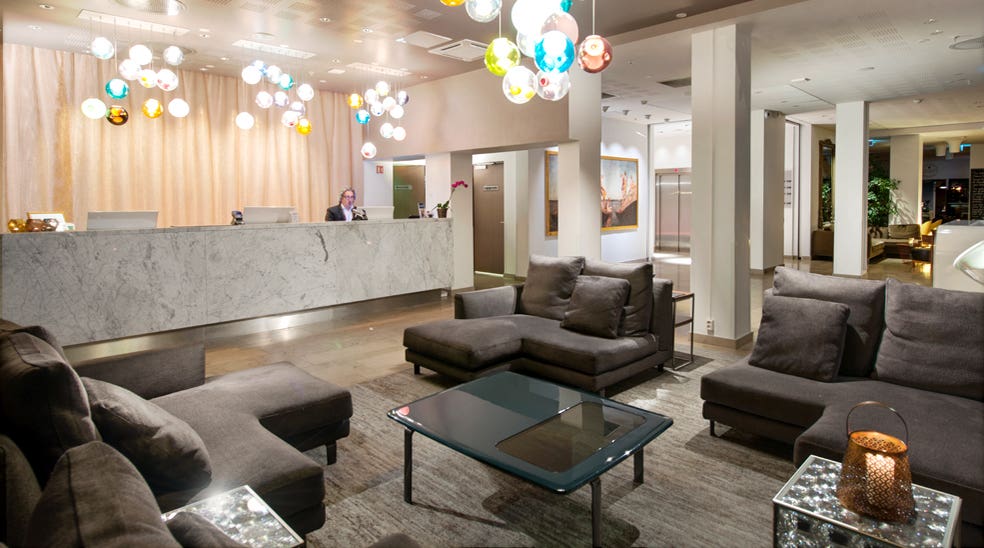 Fashionable lobby with comfortable furniture at Admiral Hotel in Bergen