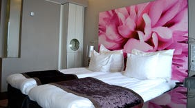 Spacious and colourful superior twin hotel room at Bergen Airport Hotel in Bergen