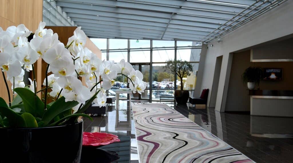 Large and bright conference lobby at Bergen Airport Hotel in Bergen