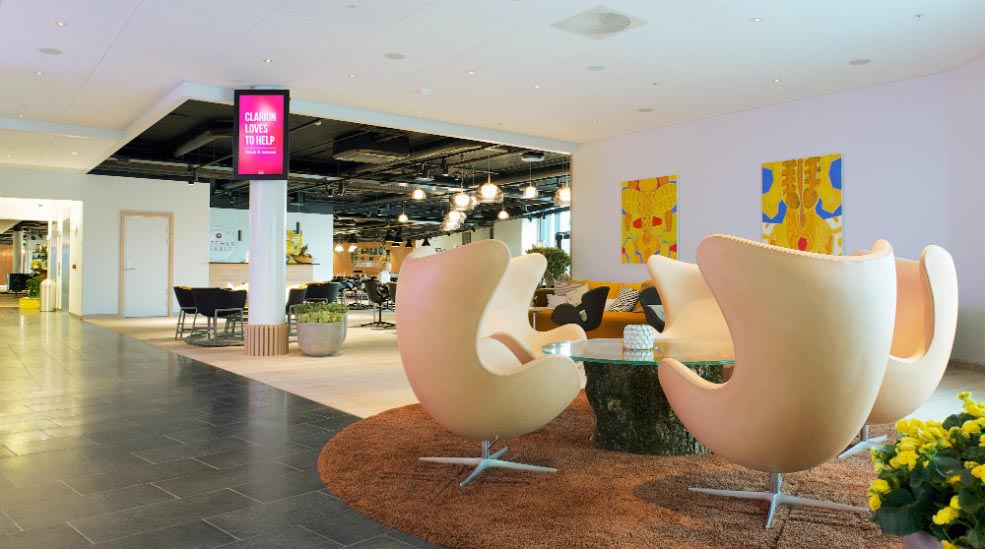 Stylish lobby area with Arne Jacobsen designer chairs at Energy Hotel in Stavanger