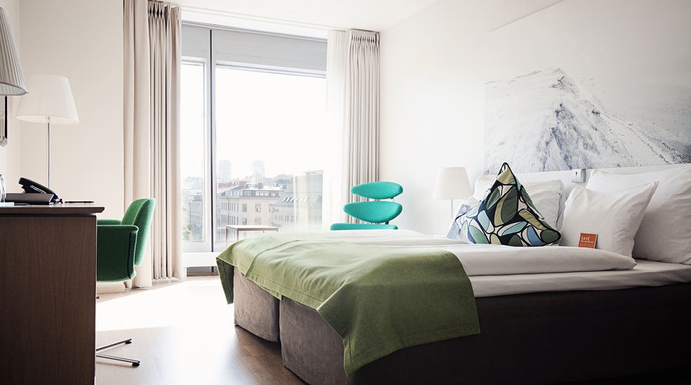 Elegant superior hotel room with a nice view of the city at Sign Hotel in Stockholm 
