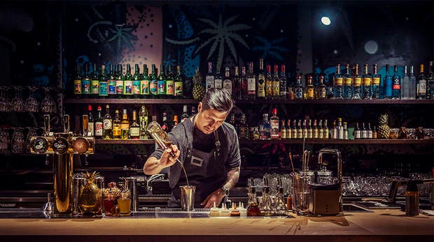 Bartender preparing cocktails at the bar at the Clarion Hotel Stockholm