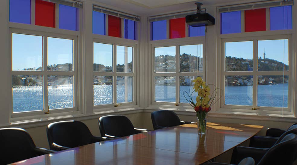 Elegant meeting room with a spectacular view of the fjord at Tyholmen Hotel in Arendal