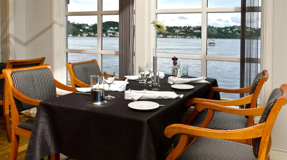 Quality restaurant with a perfect view of the fjord at Tyholmen Hotel in Arendal