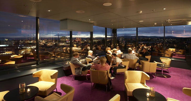 Having a nice time and enjoying the stunning view from the top floor bar at Quality Hotel 33 in Oslo
