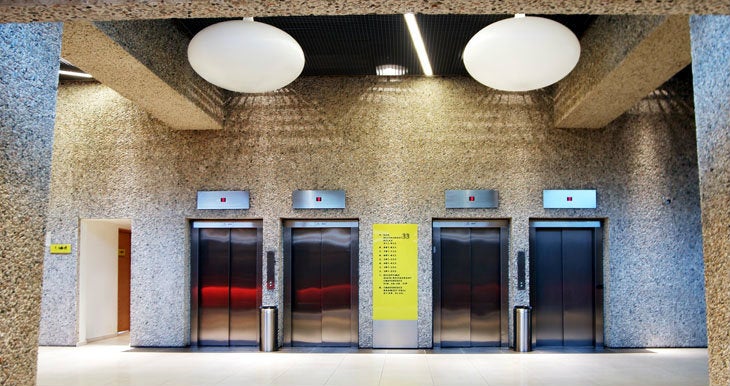 Large hotel hall and elevators at Quality Hotel 33 in Oslo