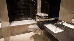Large state of the art bathroom in a deluxe hotel room at Quality Edvard Hotel in Bergen