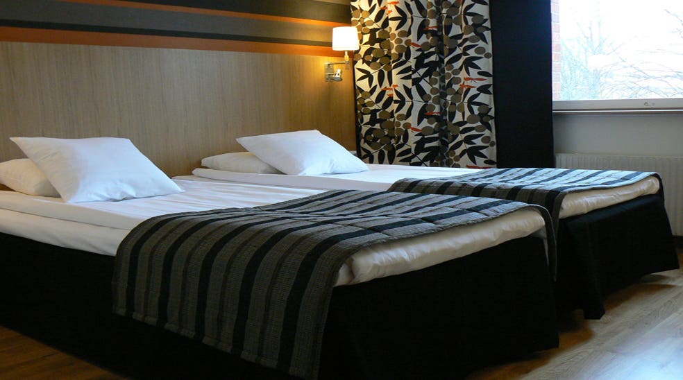 Elegant twin hotel room at Quality Galaxen Hotel in Borlange